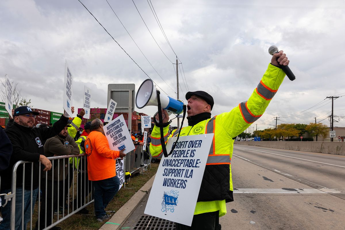 Dockworkers strike outside of the Port of Newark after members of the International Longshoremen’s Association, or ILA, began walking off the job after 12:01 a.m. ET on October 01, 2024 in Elizabeth, New Jersey. (Spencer Platt/Getty Images)