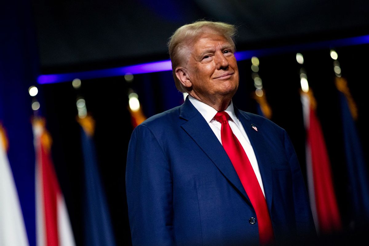 Republican presidential nominee, former U.S. President Donald Trump smiles at the crowd during the National Guard Association of the United States' 146th General Conference & Exhibition at Huntington Place Convention Center on August 26, 2024 in Detroit, Michigan. (Emily Elconin/Getty Images)