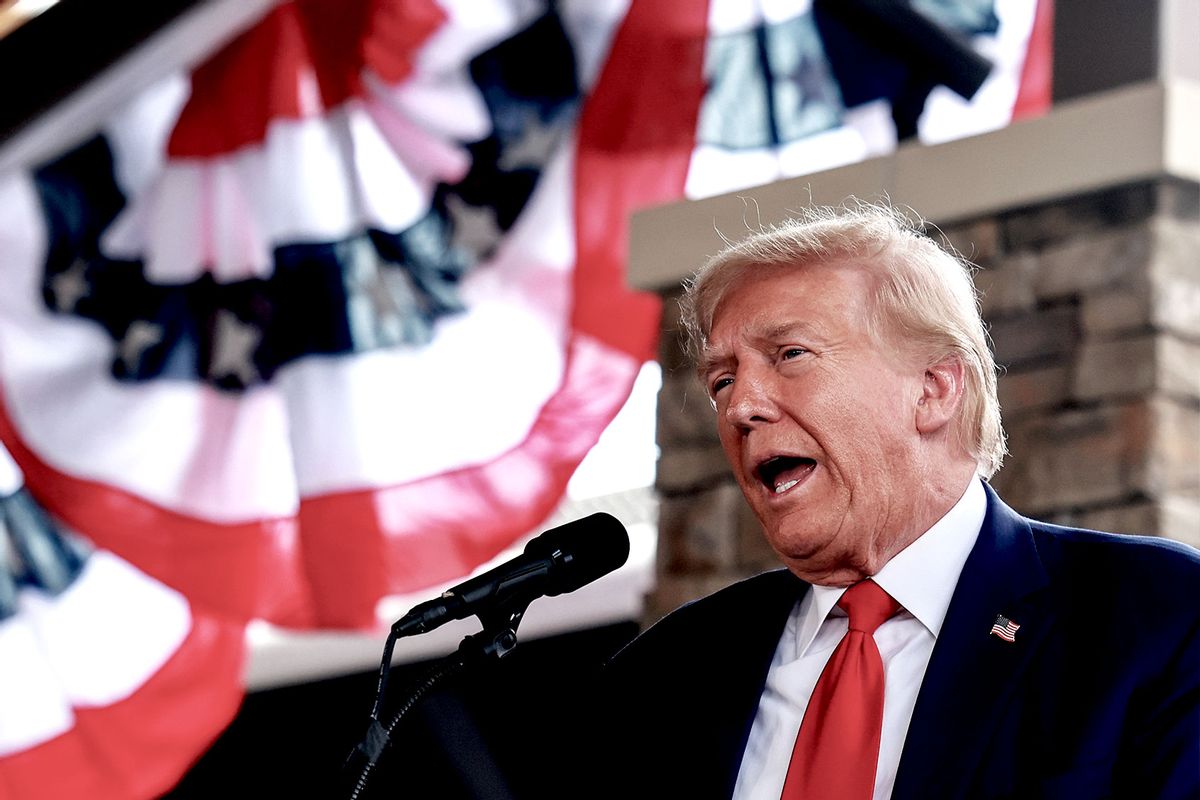 Republican presidential nominee, former U.S. President Donald Trump speaks to an audience as he visits the area while it recovers from Hurricane Helene on October 04, 2024 in Evans, Georgia. (Joe Raedle/Getty Images)