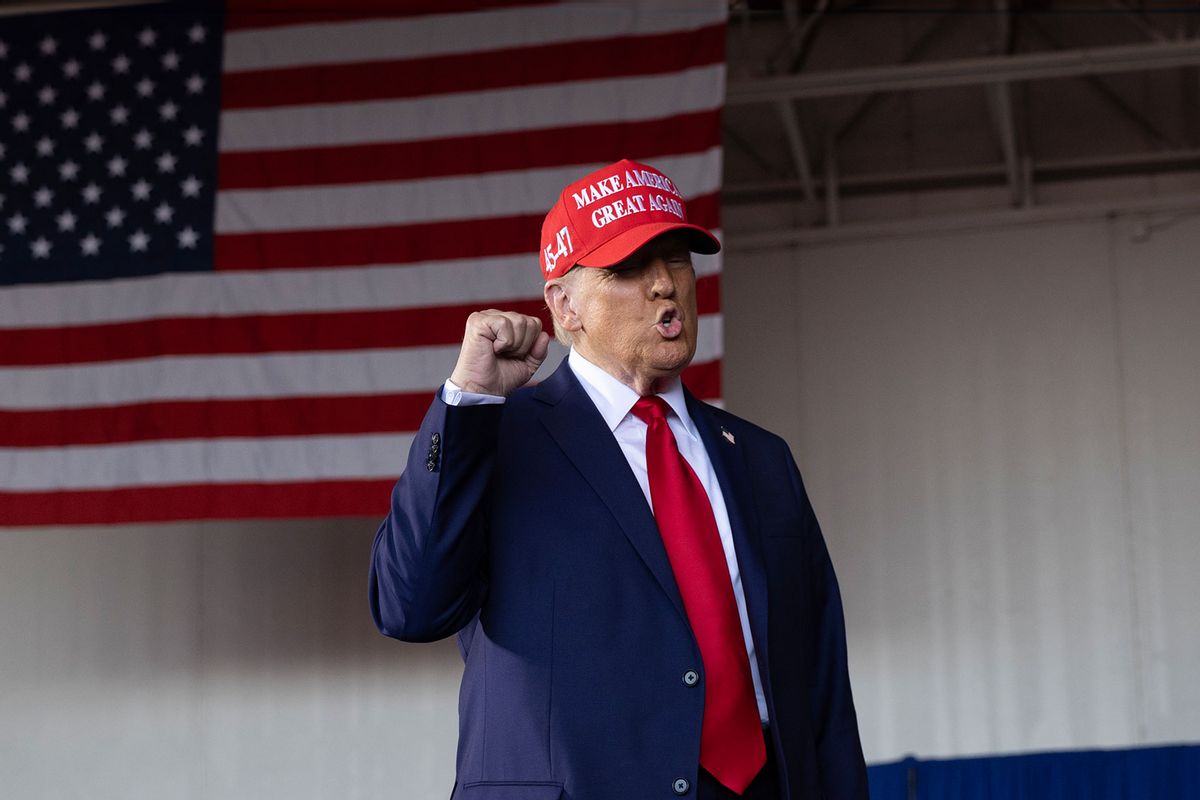 Republican presidential nominee former President Donald Trump arrives for a rally at Dodge County Airport on October 06, 2024 in Juneau, Wisconsin. (Scott Olson/Getty Images)