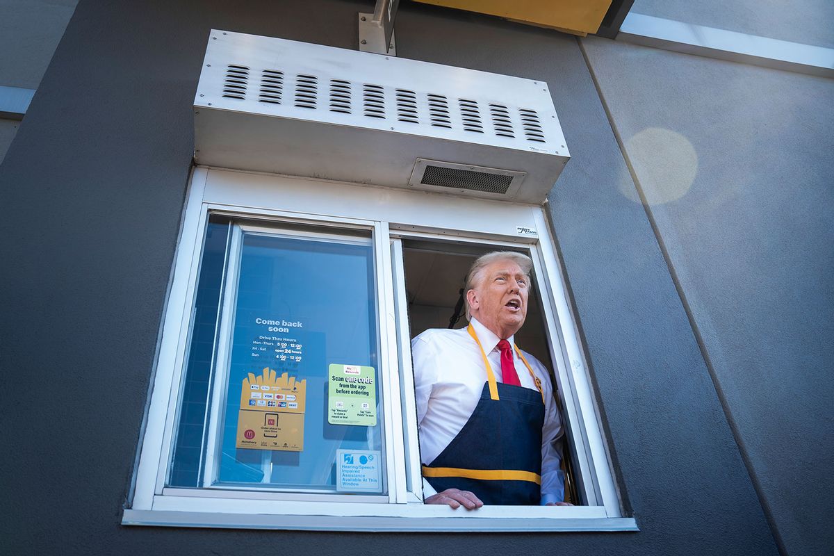 Republican presidential nominee former President Donald Trump speaks to reporters after handing out food while standing at a drive-thru window during a campaign stop at a McDonald's in Feasterville-Trevose, PA on Sunday, Oct. 20, 2024. (Jabin Botsford/The Washington Post via Getty Images)