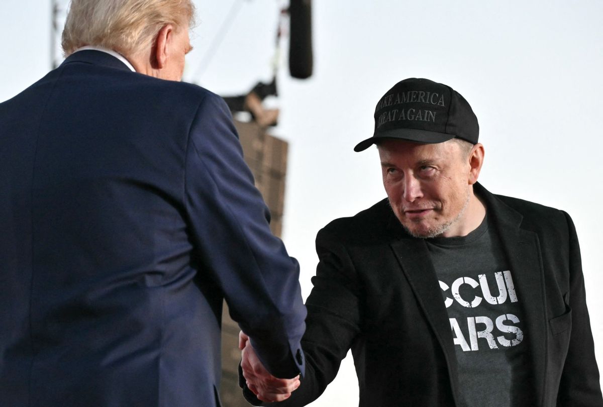 Tesla CEO Elon Musk joins former President and Republican presidential candidate Donald Trump during a campaign rally in Butler, Pennsylvania on October 5, 2024. (JIM WATSON/AFP via Getty Images)