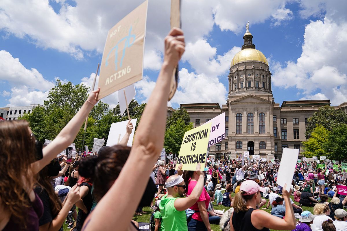 Activists rally outside the State Capitol in support of abortion rights in Atlanta, Georgia on May 14, 2022. (ELIJAH NOUVELAGE/AFP via Getty Images)