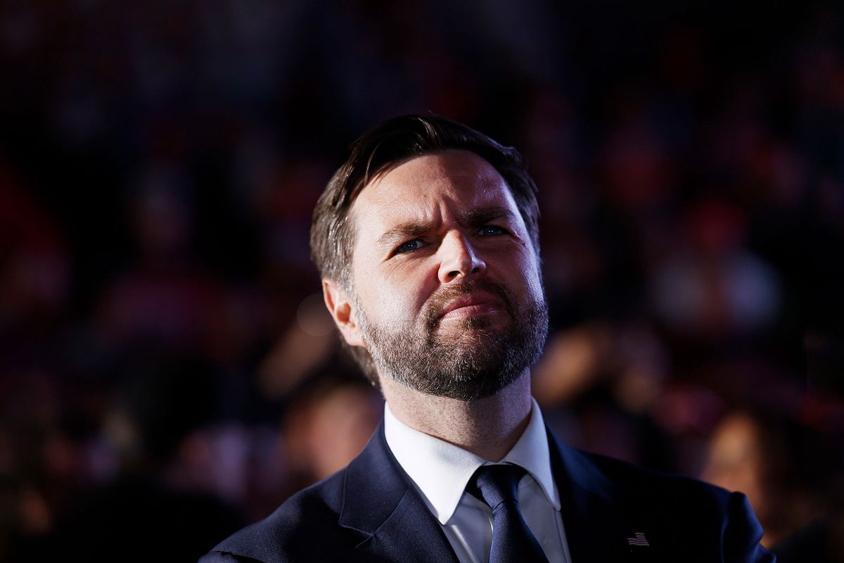 Republican vice presidential candidate Sen. JD Vance listens as Republican presidential nominee, former President Donald Trump speaks at a campaign rally at the Butler Farm Show fairgrounds on October 05, 2024 in Butler, Pennsylvania. (Anna Moneymaker/Getty Images)