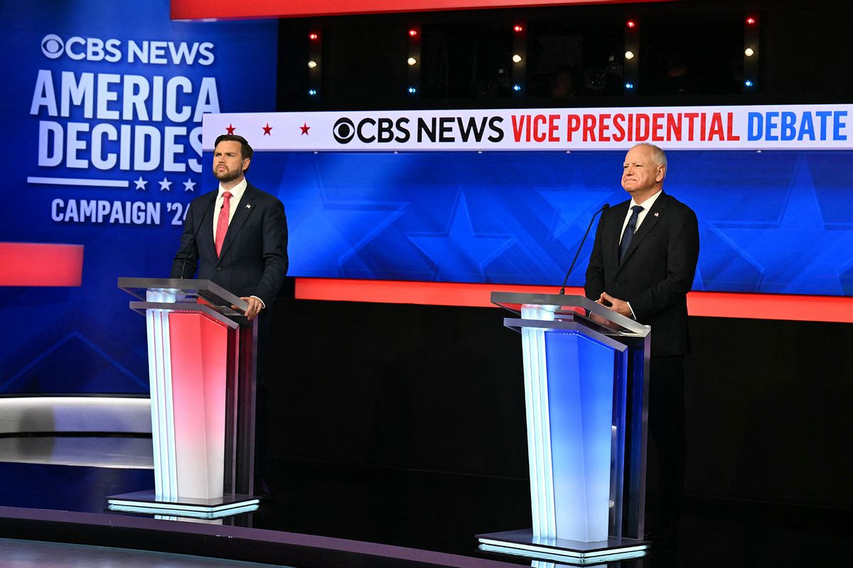 US Senator and Republican vice presidential candidate J.D. Vance (L) and Minnesota Governor and Democratic vice presidential candidate Tim Walz participate in the Vice Presidential debate hosted by CBS News at the CBS Broadcast Center in New York City on October 1, 2024. (ANGELA WEISS/AFP via Getty Images)