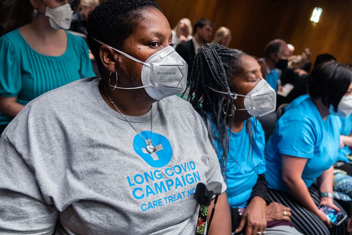 Long covid activists attend the Senate Appropriations Subcommittee on Labor, Health and Human Services, Education, and Related Agencies hearing on the "Fiscal Year 2025 Budget Request for the National Institutes of Health," in Dirksen building on Thursday, May 23, 2024. (Tom Williams/CQ-Roll Call, Inc via Getty Images)