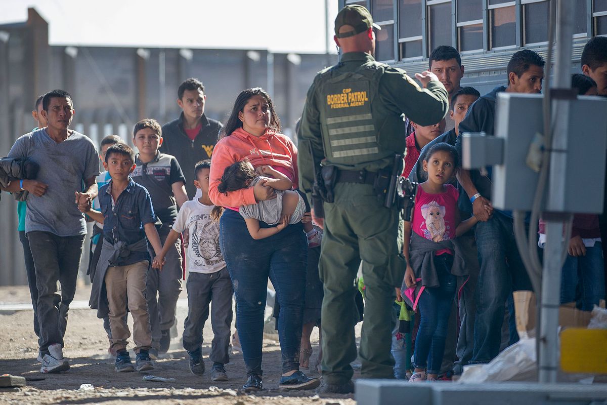 Migrants are loaded onto a bus by U.S. Border Patrol agents after being detained when they crossed into the United States from Mexico on June 01, 2019 in El Paso, Texas. (Joe Raedle/Getty Images)