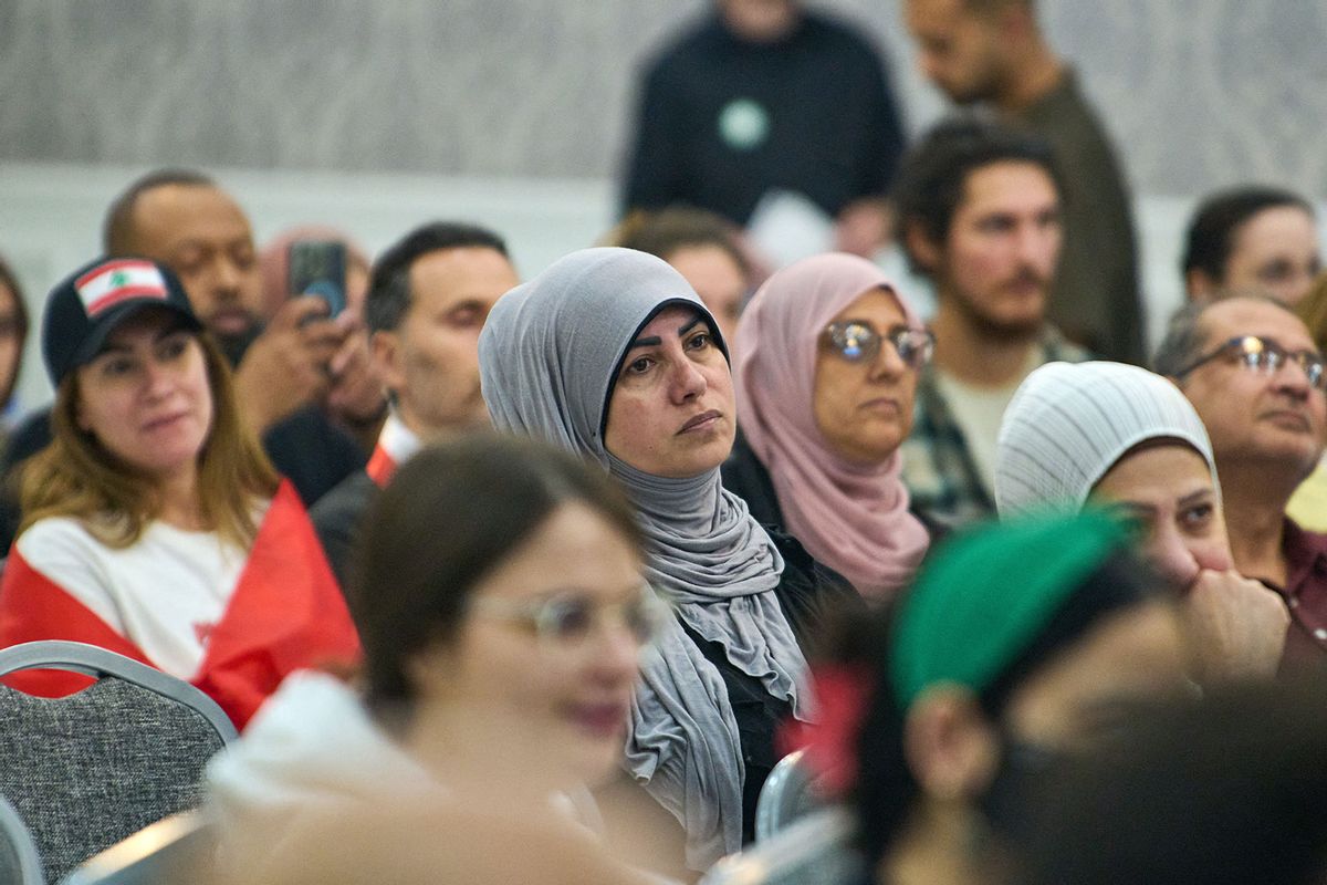 Muslim Americans attend an event by "Abandon Harris" campaign co-founder Hassan Abdel Salam endorsing Green Party candidate Jill Stein for president at the Bint Jebail Cultural Center in Dearborn, MI on Friday, Oct. 6, 2024. (DOMINIC GWINN/Middle East Images/AFP via Getty Images)