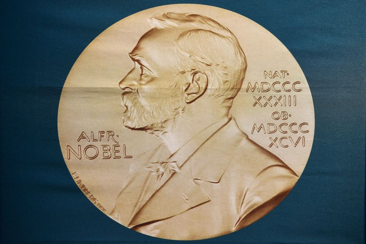 A portrait of Swedish inventor and scholar Alfred Nobel can be seen on a banner on display at the Nobel Forum in Stockholm, Sweden, prior to a press conference to announce the winner of the 2018 Nobel Prize in Physiology or Medicine at the Karolinska Institute in Stockholm, Sweden, on October 1, 2018. (JONATHAN NACKSTRAND/AFP via Getty Images)