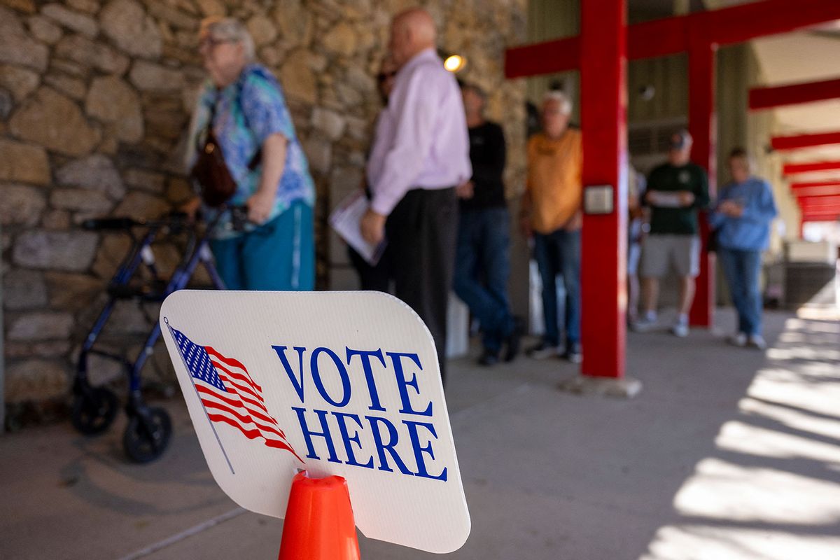 People line up for early voting at a polling station at the Black Mountain Public Library in Black Mountain, North Carolina on October 21, 2024. (JIM WATSON/AFP via Getty Images)