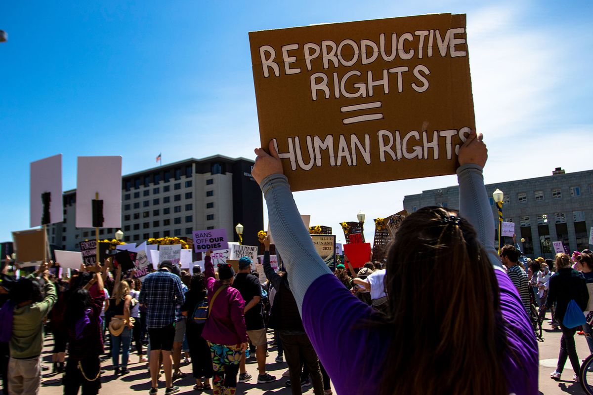 A protester holds a placard up that says "Reproductive rights = Human rights" in Reno, Nevada on May 07, 2022. (Ty O'Neil/SOPA Images/LightRocket via Getty Images)