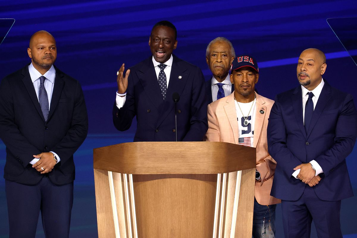 Representatives from “the Central Park Five,” New York City Council Member Dr. Yusef Salaam (2nd-L) speaks on stage as (L-R) Activist Kevin Richardson, Rev. Al Sharpton, Activist Korey Wise, and Activist Raymond Santana look on during the final day of the Democratic National Convention at the United Center on August 22, 2024 in Chicago, Illinois. (Chip Somodevilla/Getty Images)