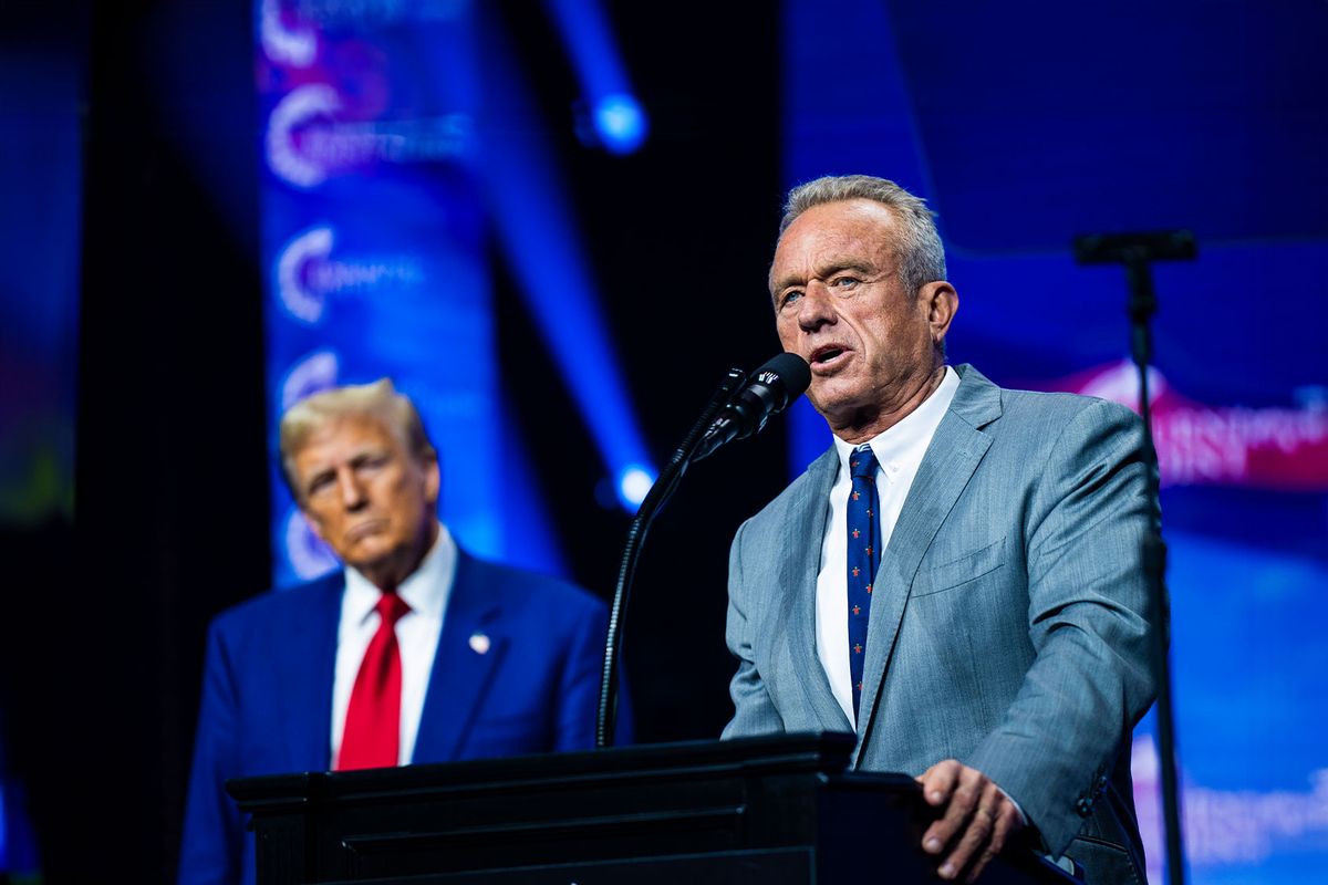 Robert F. Kennedy Jr. speaks with Republican presidential nominee former President Donald Trump at a Turning Point Action Rally in Duluth, GA on Wednesday, Oct. 23, 2024. (Jabin Botsford/The Washington Post via Getty Images)