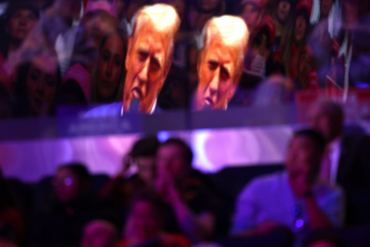 Republican presidential nominee, former U.S. President Donald Trump is reflected off a window as he speaks at a campaign rally at Madison Square Garden on October 27, 2024 in New York City. Trump closed out his weekend of campaigning in New York City with a guest list of speakers that includes his running mate Republican Vice Presidential nominee, U.S. Sen. J.D. Vance (R-OH), Tesla CEO Elon Musk, UFC CEO Dana White, and House Speaker Mike Johnson, among others, nine days before Election Day. (Photo by Michael M. Santiago/Getty Images)