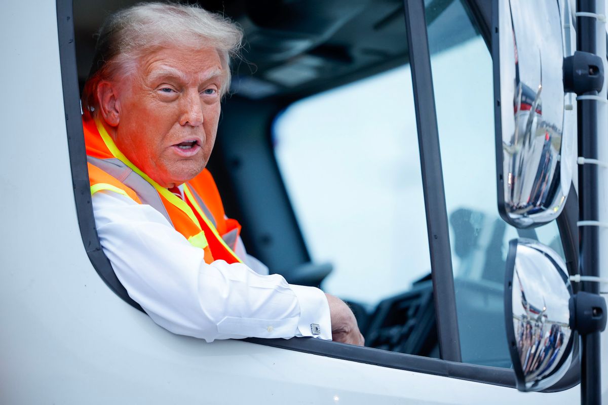 Republican presidential nominee, former President Donald Trump holds a press conference from inside trash hauler at Green Bay Austin Straubel International Airport on October 30, 2024 in Green Bay, Wisconsin. With less than a week until Election Day, Trump is campaigning for re-election in the battleground states of North Carolina and Wisconsin. (Photo by Chip Somodevilla/Getty Images)