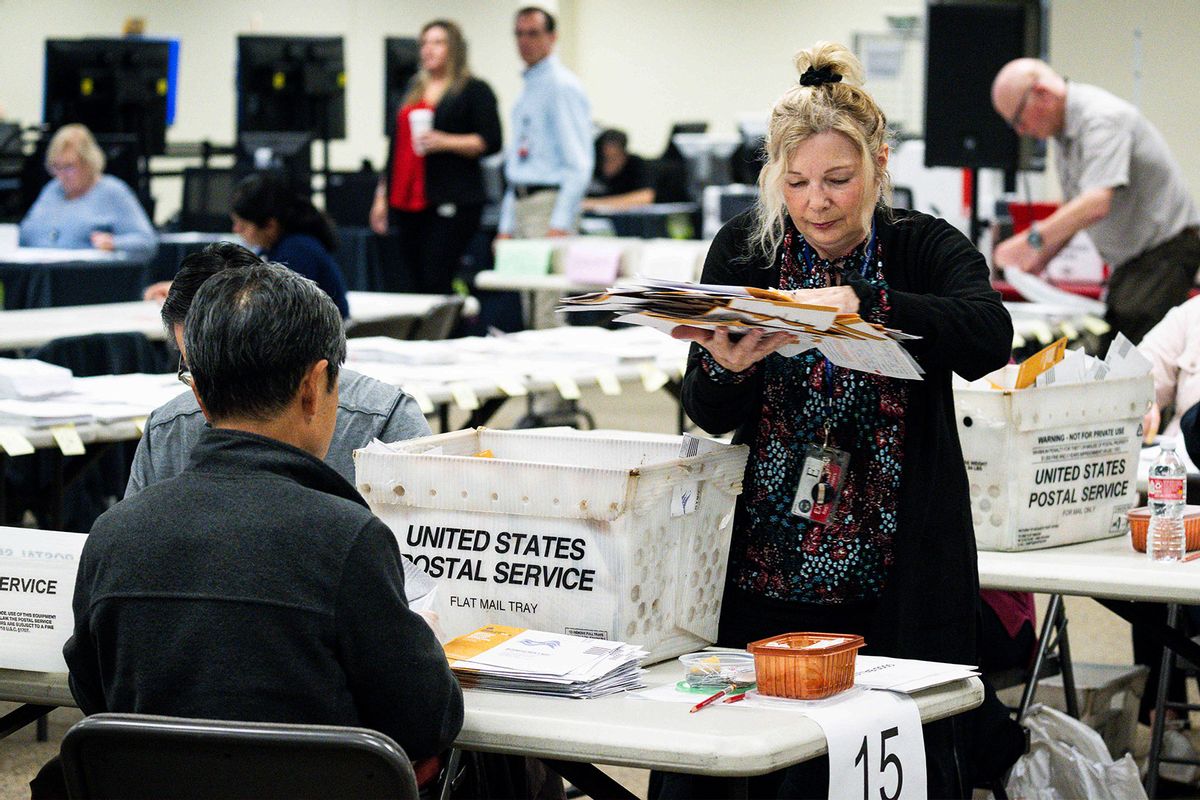 Staff works in the vote-by-mail ballot processing at the Orange County Registrar of Voters facility in Santa Ana, CA on Monday, February 26, 2024. (Paul Bersebach/MediaNews Group/Orange County Register via Getty Images)