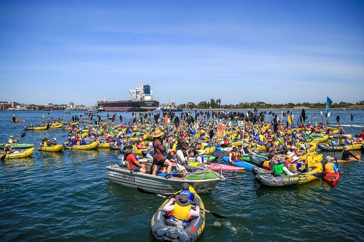 Climate protestors in kayaks continue their attempt to block access to Newcastle coal port during the People's Blockade on November 24, 2024 in Newcastle, Australia. (Roni Bintang/Getty Images)