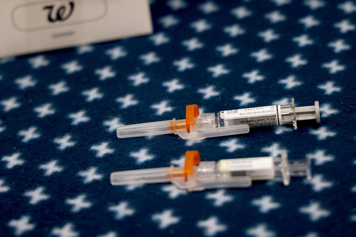 Injections for Comirnaty Pfizer vaccine for COVID and the Fluzone H,D. for influenza are ready to be given to a patient at the Walgreens pharmacy in Torrance on September 5, 2024. (Genaro Molina/Los Angeles Times via Getty Images)