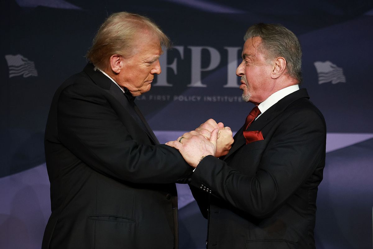 U.S. President-elect Donald Trump greets actor Sylvester Stallone onstage at the America First Policy Institute Gala held at Mar-a-Lago on November 14, 2024 in Palm Beach, Florida. (Joe Raedle/Getty Images)