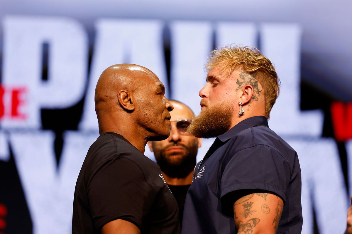 Mike Tyson and Jake Paul speak onstage at the press conference in promotion for the upcoming Jake Paul vs. Mike Tyson boxing match at The Apollo Theater on May 13, 2024 in New York City. (Sarah Stier/Getty Images for Netflix)