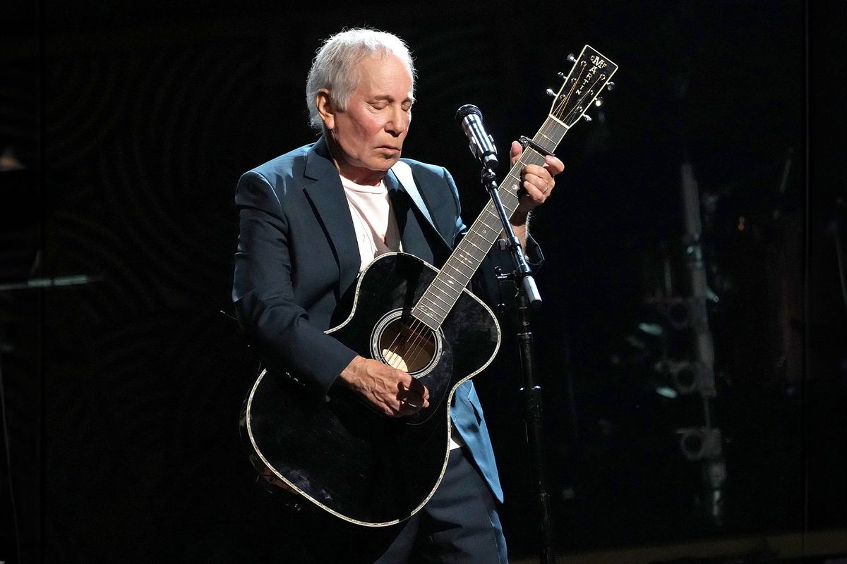 In this image released on December 21, Paul Simon performs onstage during Homeward Bound: A GRAMMY Salute To The Songs Of Paul Simon at Hollywood Pantages Theatre on April 06, 2022 in Hollywood, California. (Kevin Mazur/Getty Images for The Recording Academy)