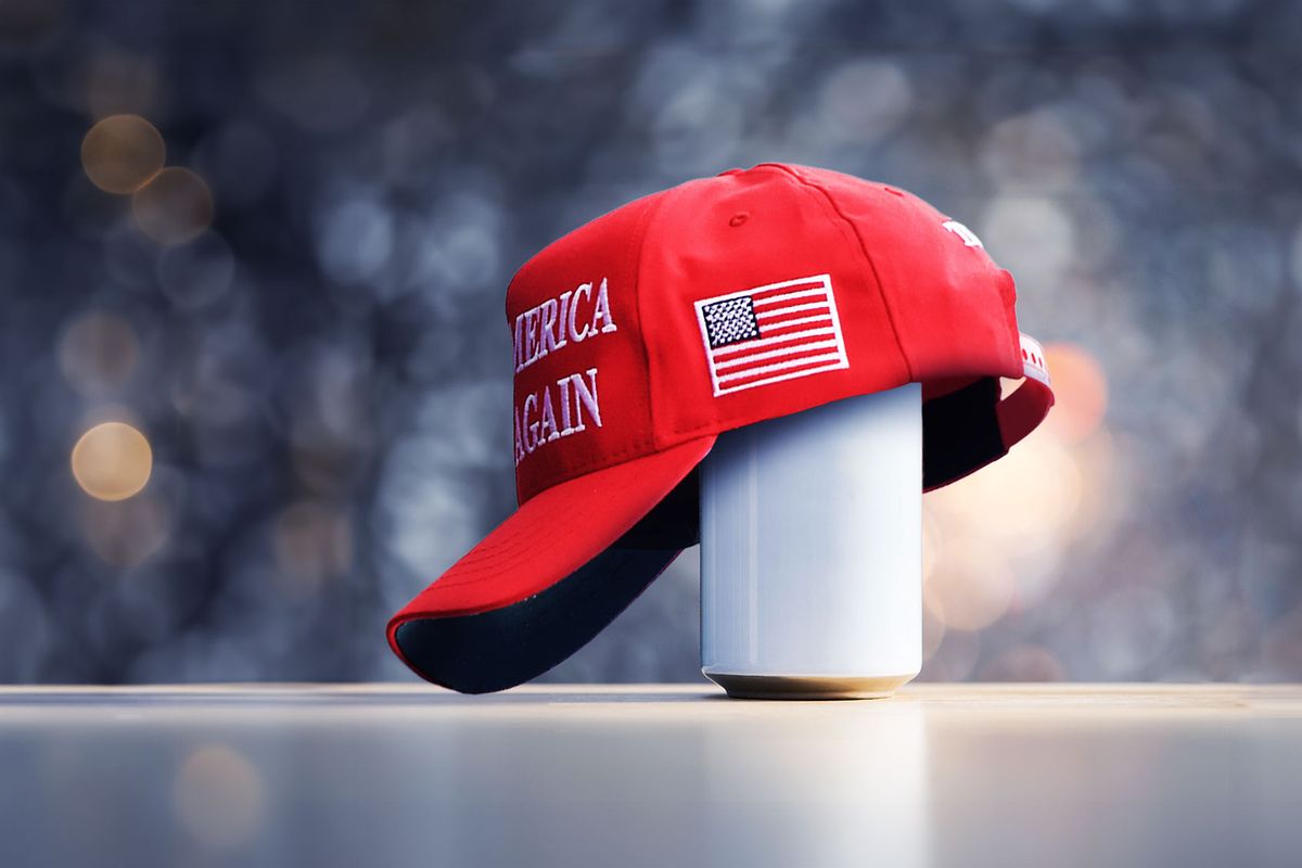 Red MAGA hat on a can (Photo illustration by Salon/Getty Images)