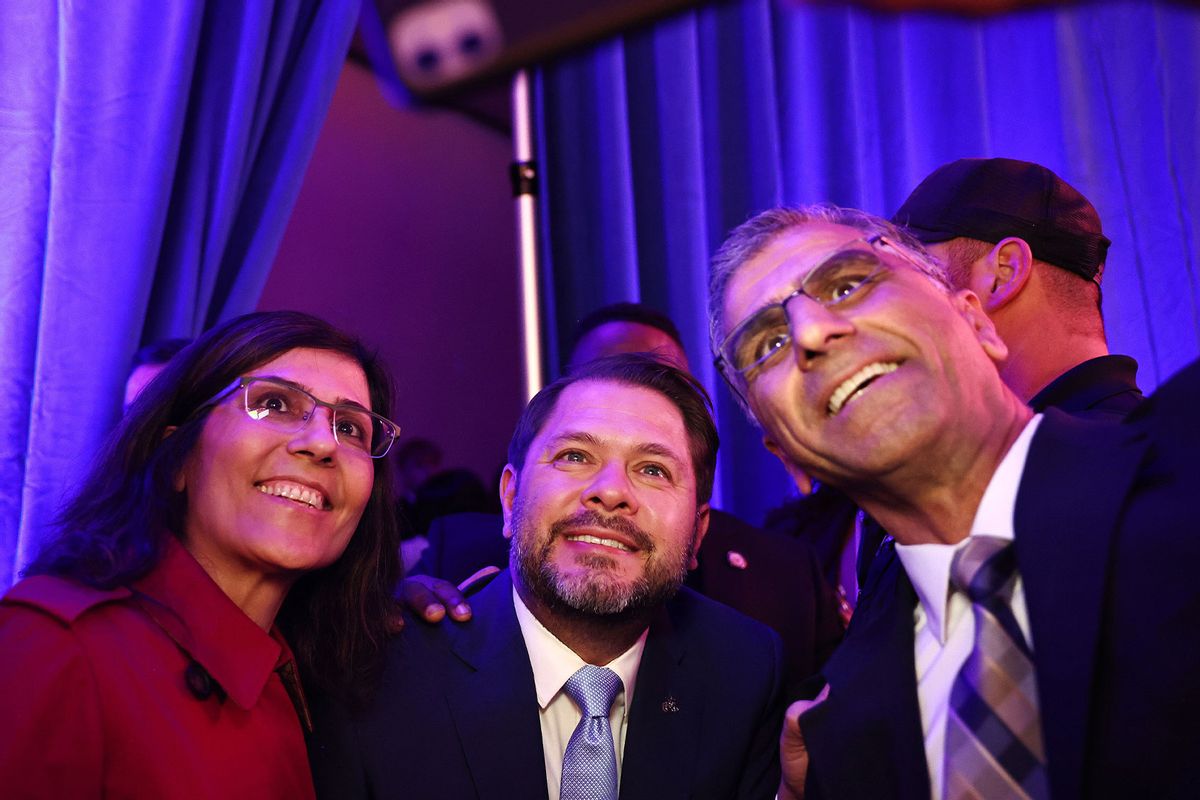 Arizona Democratic Senate candidate U.S. Rep. Ruben Gallego (D-AZ) (C) poses for a selfie with supporters after speaking at the Arizona Democratic Election Night Watch Party on November 5, 2024 in Phoenix, Arizona. (Mario Tama/Getty Images)