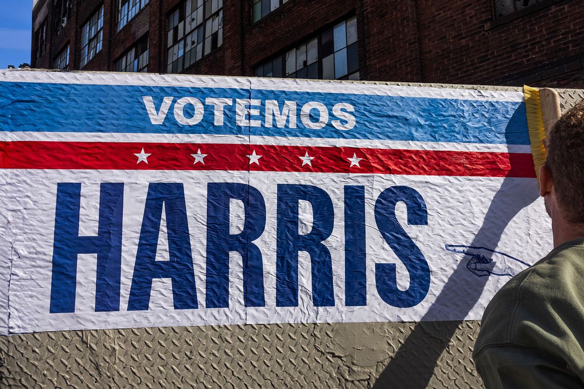 Supporters of Kamala Harris put up posters in latino neighborhoods, October 14, 2024, in North Philadelphia, Pennsylvania. (Andrew Lichtenstein/Corbis via Getty Images)