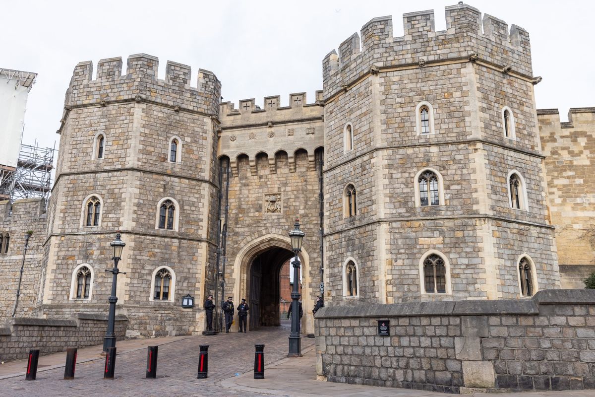 Armed police officers stand outside Windsor Castle on February 6, 2024, in Windsor, United Kingdom.  (Mark Kerrison/In Pictures via Getty Images)