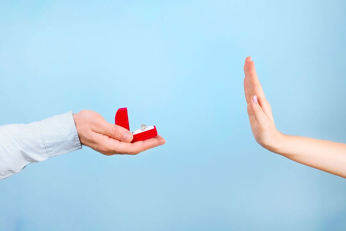 Woman rejecting marriage proposal (Getty Images/Evrymmnt)