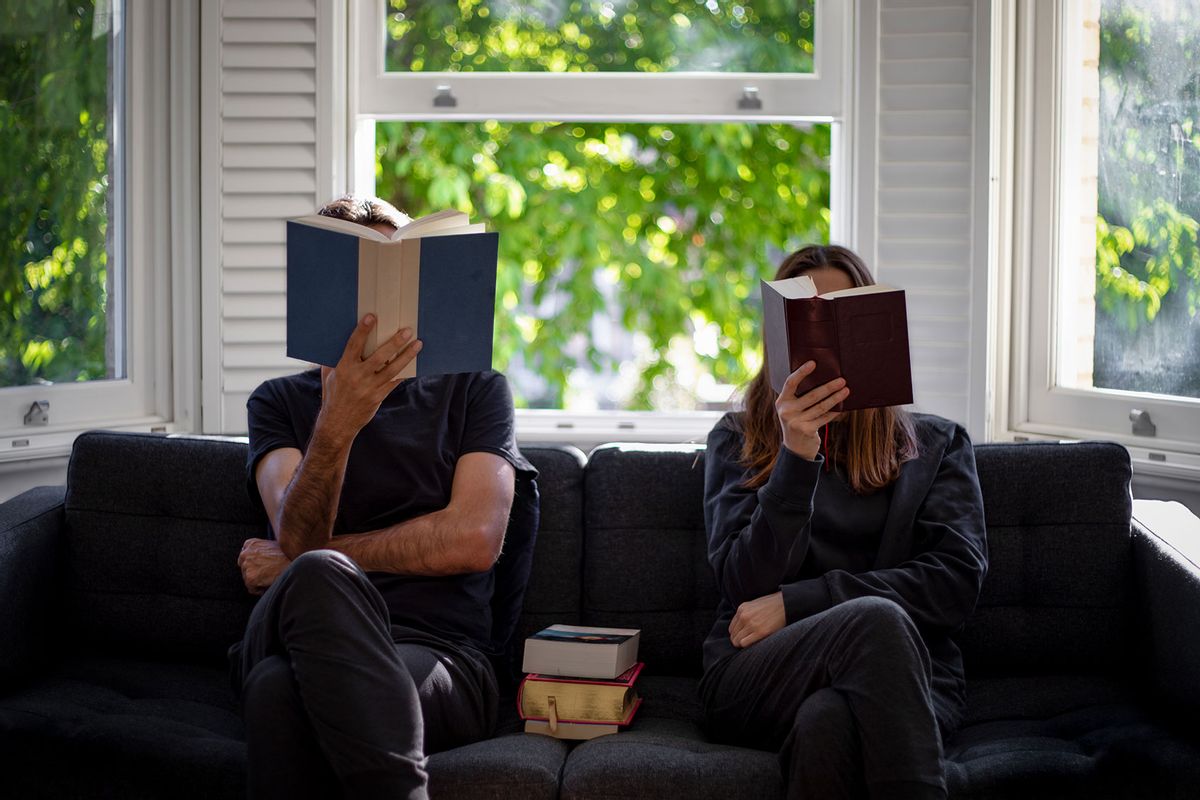 A couple reading books at home (Getty Images/Basak Gurbuz Derman)