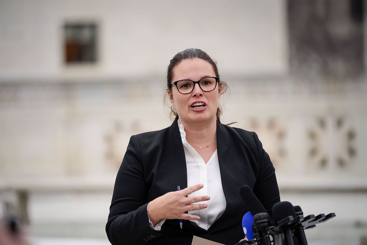 Allison Riggs, chief counsel of voting rights at the Southern Coalition for Social Justice, talks to reporters outside the U.S. Supreme Court after she attended oral arguments in the Moore v. Harper case December 7, 2022 in Washington, DC. (Drew Angerer/Getty Images)