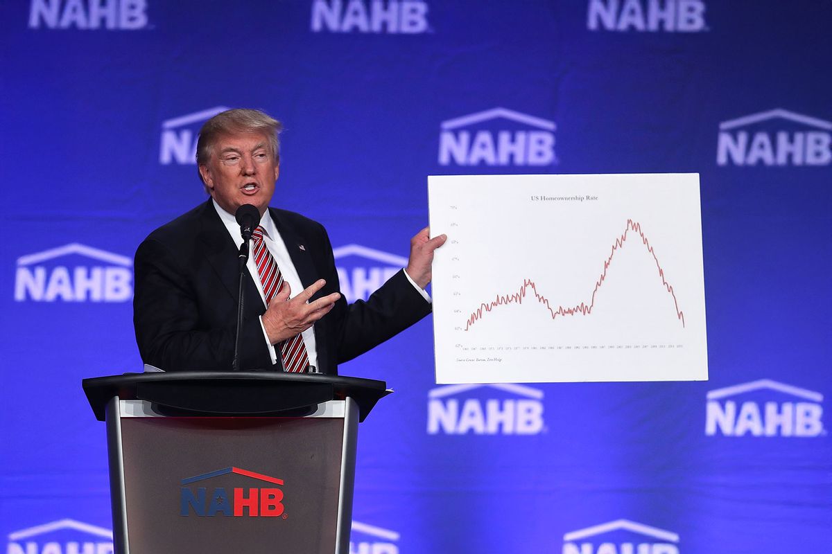 Republican presidential nominee Donald Trump holds up a chart showing what he say's is home ownership rates as he speaks during an address to the National Association of Home Builders at the Fontainebleau Miami Beach hotel on August 11, 2016 in Miami Beach, Florida. (Joe Raedle/Getty Images)