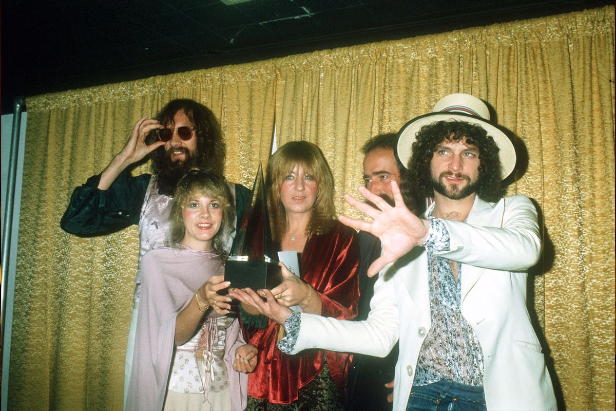 Fleetwood Mac (L-R Mick Fleetwood, Stevie Nicks, Christine McVie, John McVie and Lindsey Buckingham) pose for photographers backstage at the 5th American music Awards held at the Santa Monica Civic Auditorium on January 16, 1978 in Santa Monica, California. (Michael Ochs Archives/Getty Images)