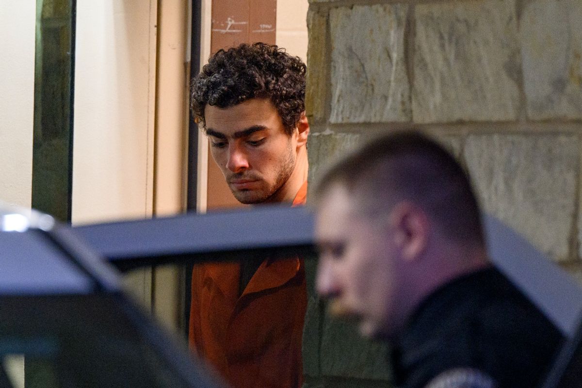 Suspected shooter Luigi Mangione is led from the Blair County Courthouse after an extradition hearing December 10, 2024 in Hollidaysburg, Pennsylvania. (Jeff Swensen/Getty Images)