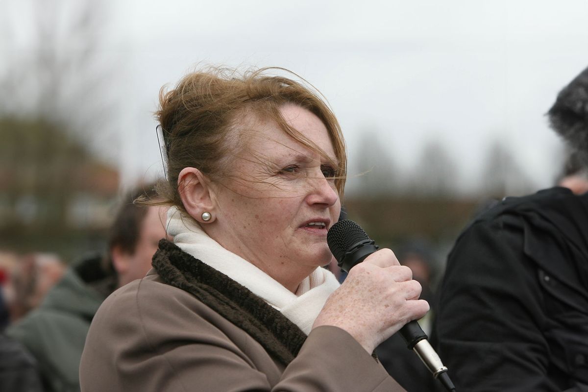 Marian Price, who was jailed for her part in the IRA London bombing campaign of 1973, reads a statement at a 32 County Sovereignty Movement Easter commemoration ceremony at Creggan cemetery in Londonderry. (Niall Carson/PA Images via Getty Images)