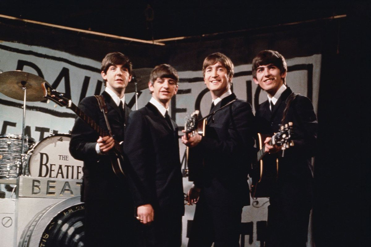 The Beatles, from left to right Paul McCartney, Ringo Starr, John Lennon (1940 - 1980), and George Harrison (1943 - 2001), performing in front of a camera-shaped drum kit on Granada TV's Late Scene Extra television show filmed in Manchester, England on November 25, 1963. (Hulton Archive/Getty Images)