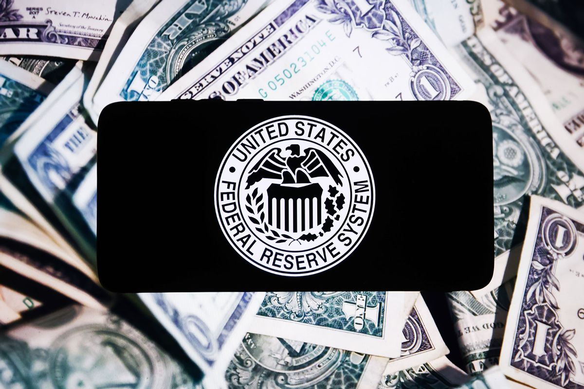 United States The Federal Reserve System seal is displayed on a mobile phone screen. (Beata Zawrzel/NurPhoto via Getty Images)