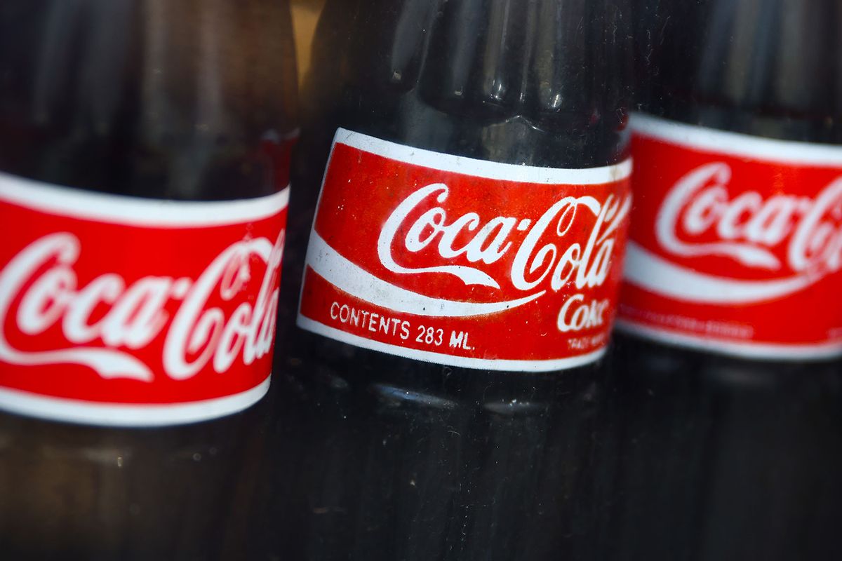 Vintage Coca-Cola bottles are seen in a shop window in Manhattan, New York City, United States of America on July 15th, 2024. (Beata Zawrzel/NurPhoto via Getty Images)