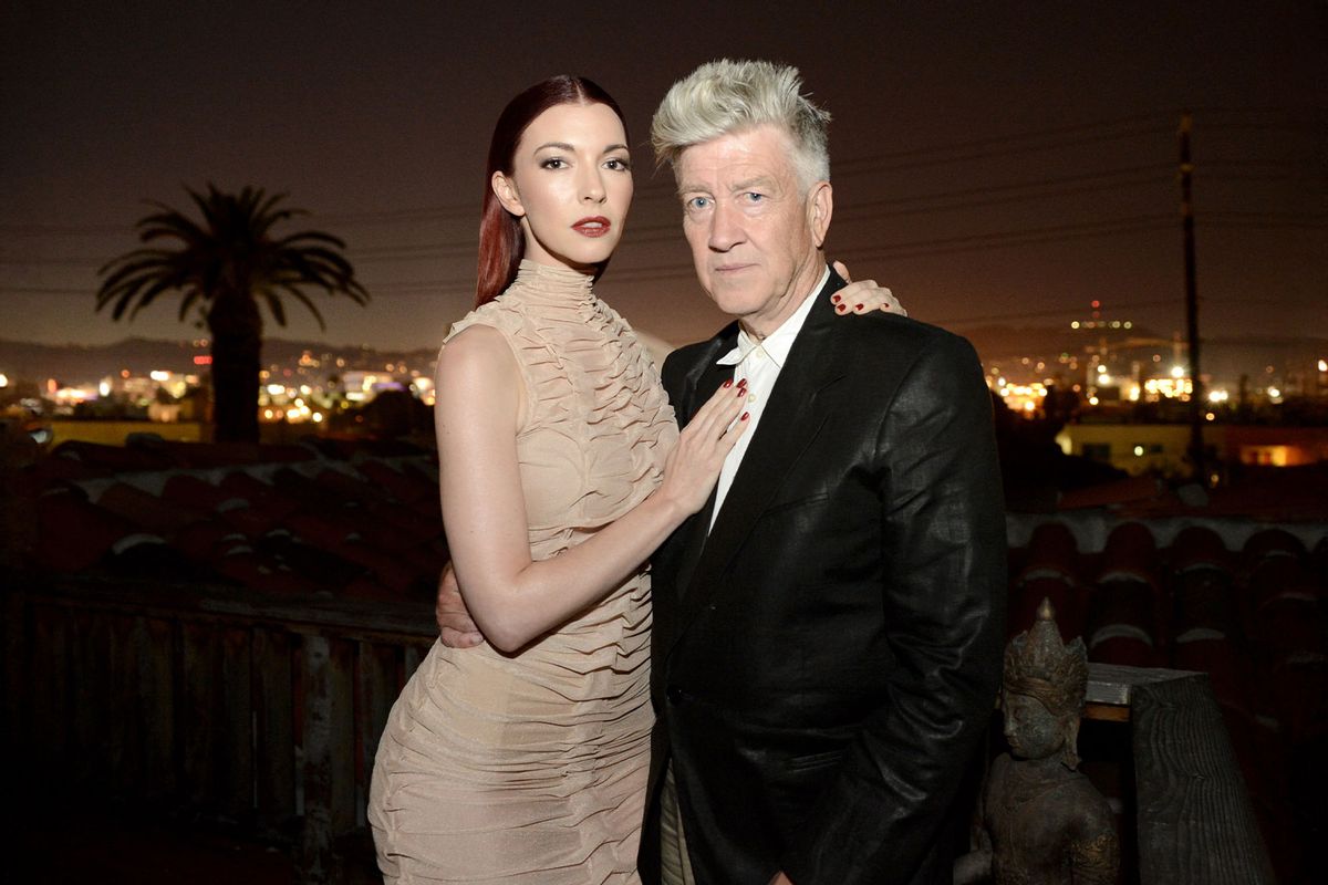 Singer Chrysta Bell (L) and director David Lynch pose before Bell's performance at The Hollywood Forever Cemetery on May 12, 2013 in Los Angeles, California. (Kevin Winter/Getty Images)