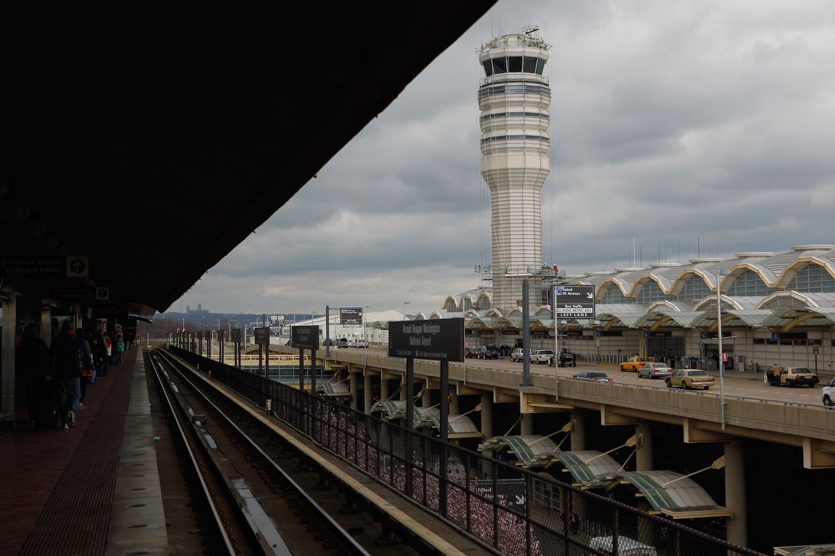  The control tower at Ronald Reagan National Airport as seen from a Metro train stop in Washington, DC. (Photo by Chip Somodevilla/Getty Images)