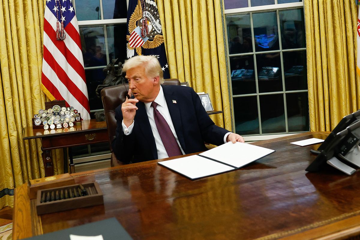 President Donald Trump signs executive orders in the Oval Office of the White House on January 20, 2025 in Washington, DC. (Anna Moneymaker/Getty Images)