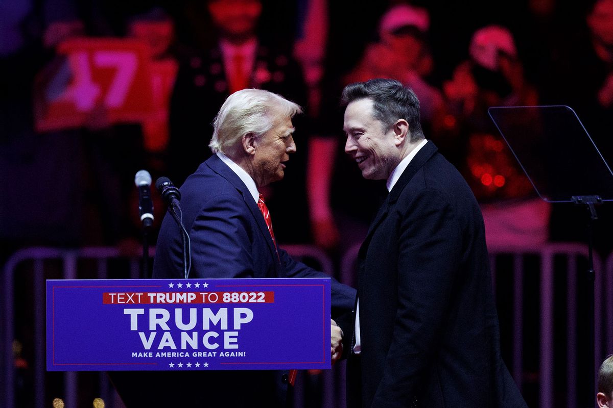 Tesla Founder Elon Musk walks on stage with his son, X, beside President-elect Donald Trump during a rally at Capital One Arena in Washington, on January 19, 2025. (Tom Brenner for The Washington Post via Getty Images)