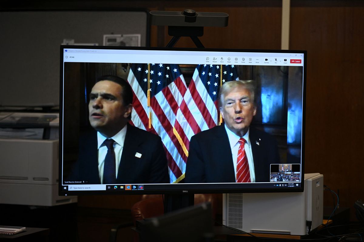 U.S. President-elect Donald Trump appears remotely for a sentencing hearing in front of New York State Judge Juan Merchan with his attorney Todd Blanche (L) at Manhattan Criminal Court on January 10, 2025 in New York City. (Curtis Means - Pool/Getty Images)