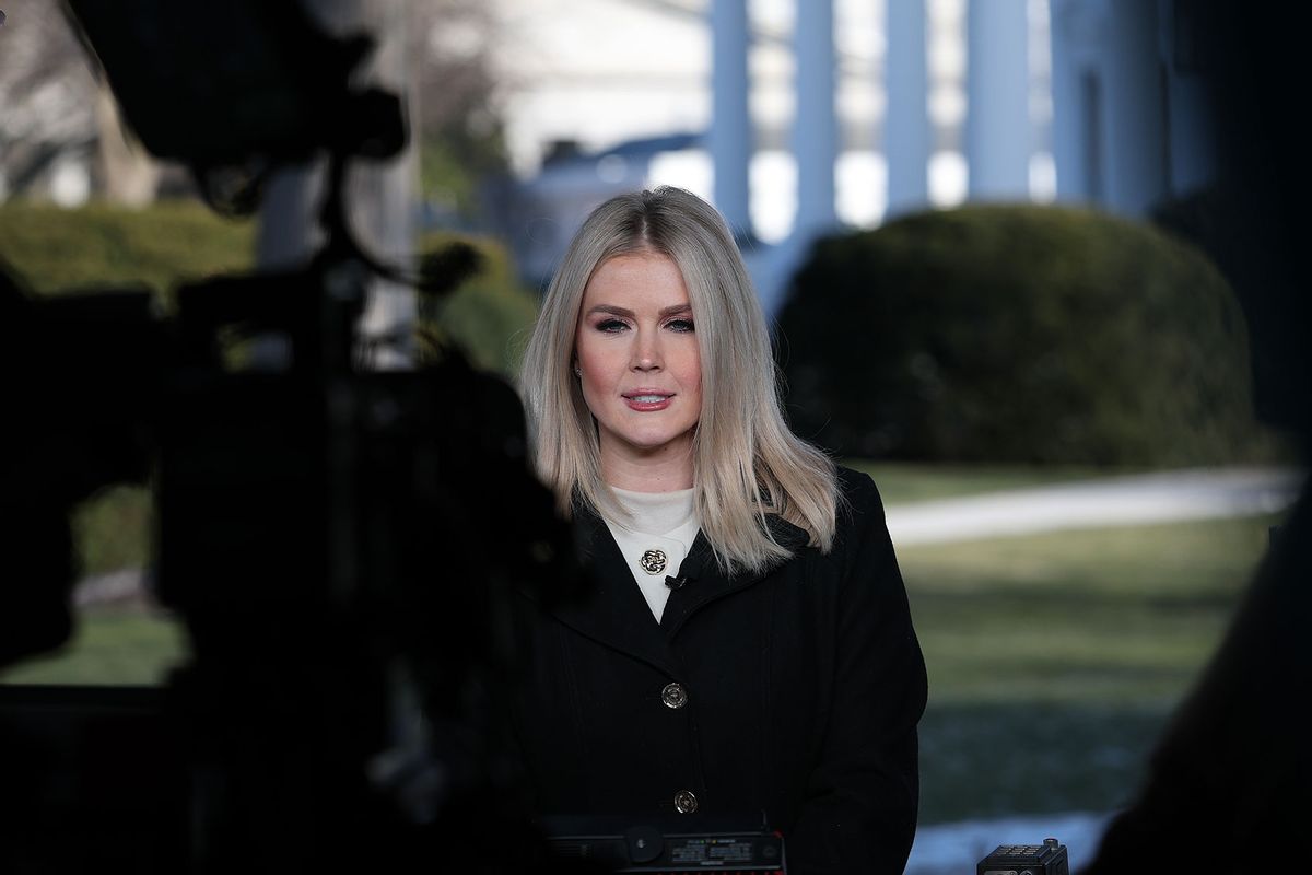 White House Press Secretary Karoline Leavitt (C) answers questions during a short interview with Fox News outside the White House on January 22, 2025 in Washington, DC. (Win McNamee/Getty Images)