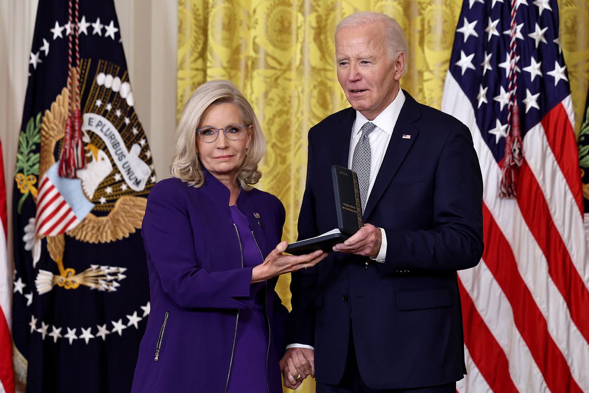 U.S. President Joe Biden presents former U.S. Rep. Liz Cheney (R-WY) with the Presidential Citizens Medal during a ceremony in the East Room of the White House on January 02, 2025 in Washington, DC. (Chip Somodevilla/Getty Images)