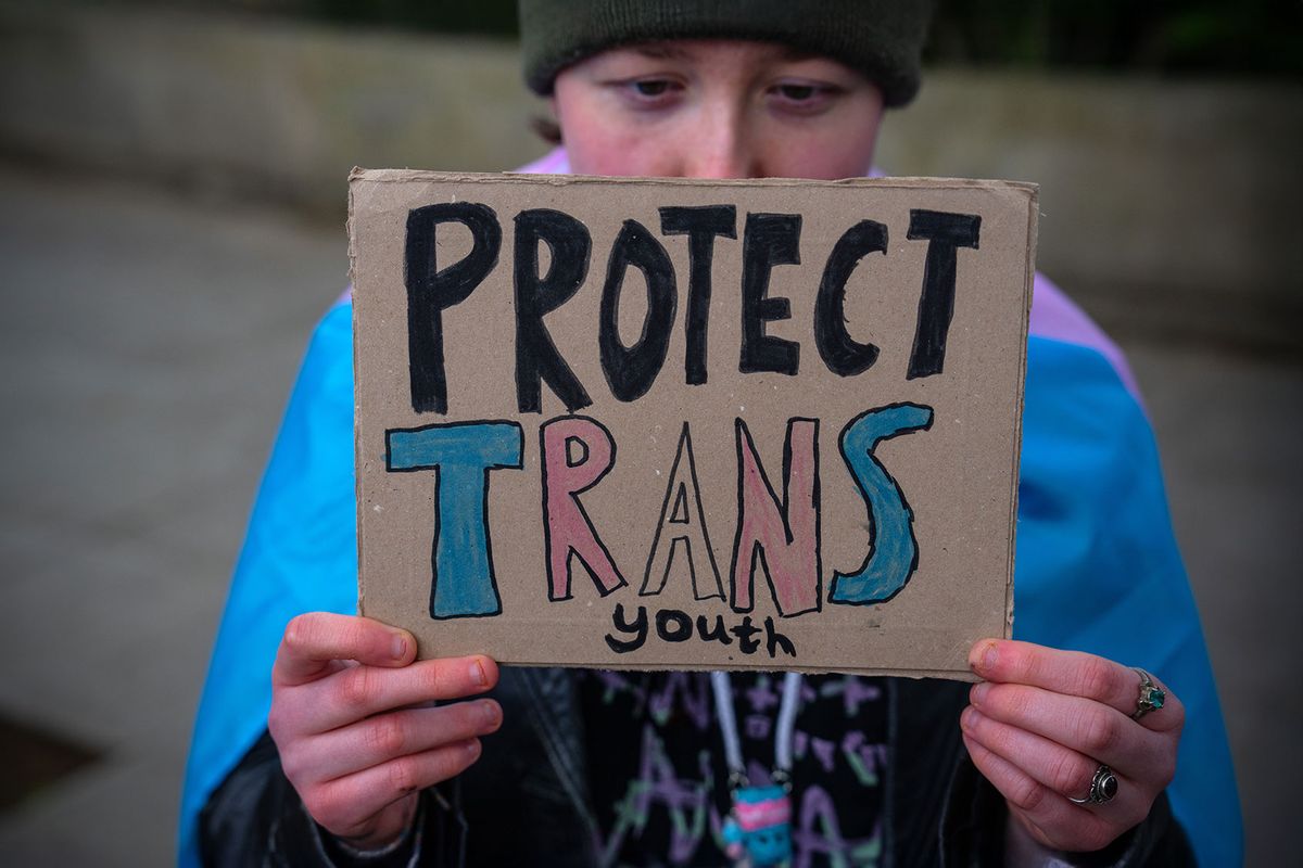 Trans rights activists take part in a protest. (Carl Court/Getty Images)