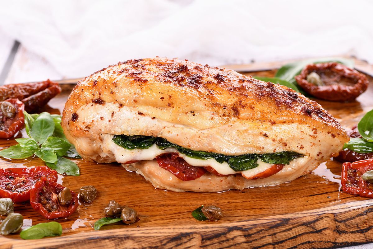 Baked chicken breast with spinach, sun-dried tomatoes and mozzarella (Getty Images/marina200707/500px)