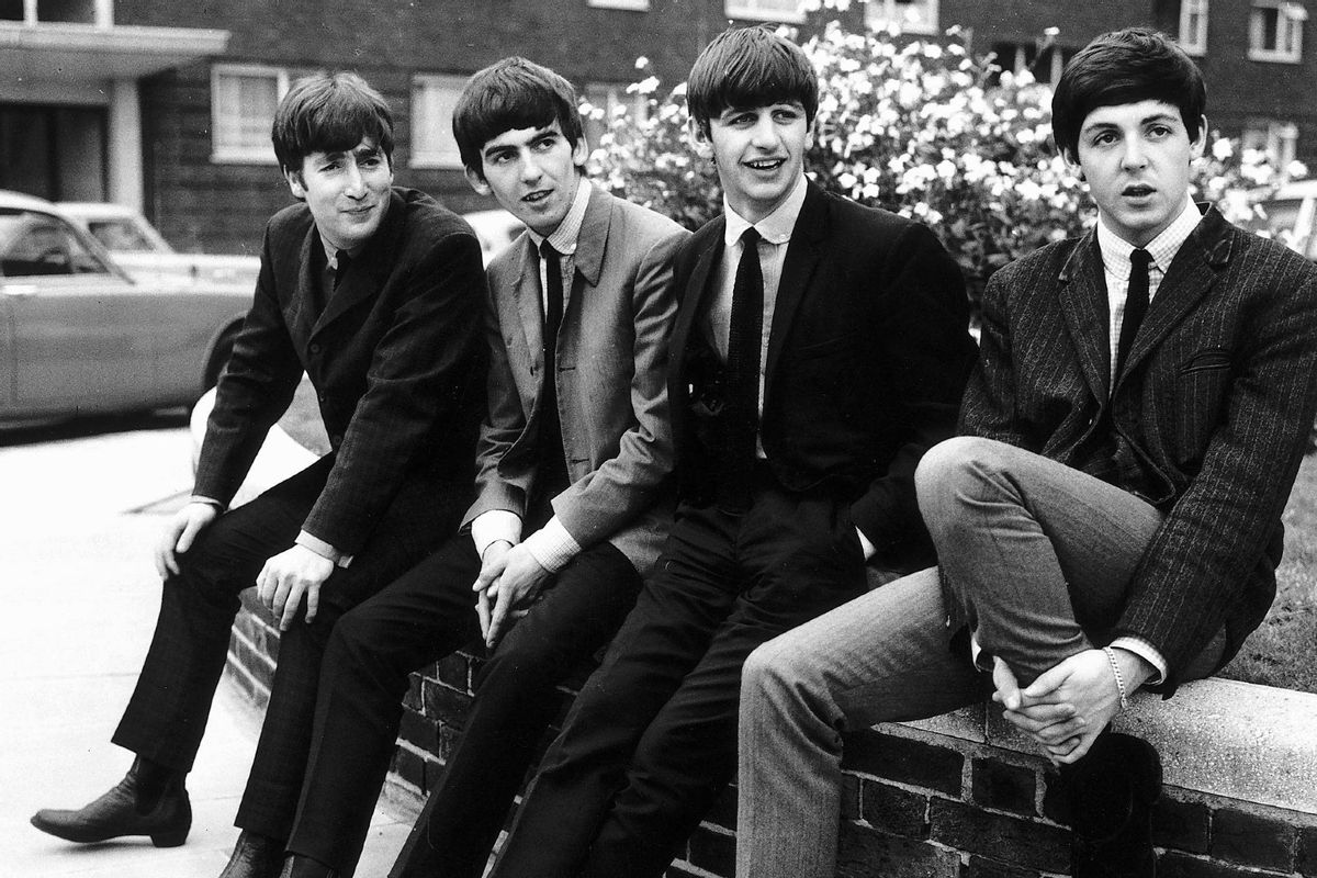 The Beatles, pose for pictures after being interviewed by Donald Zec, Daily Mirror Journalist, at his Flat in Maitland Court, Lancaster Terrace, London. 9th September 1963.  (Bela Zola/Daily Mirror/Mirrorpix via Getty Images)