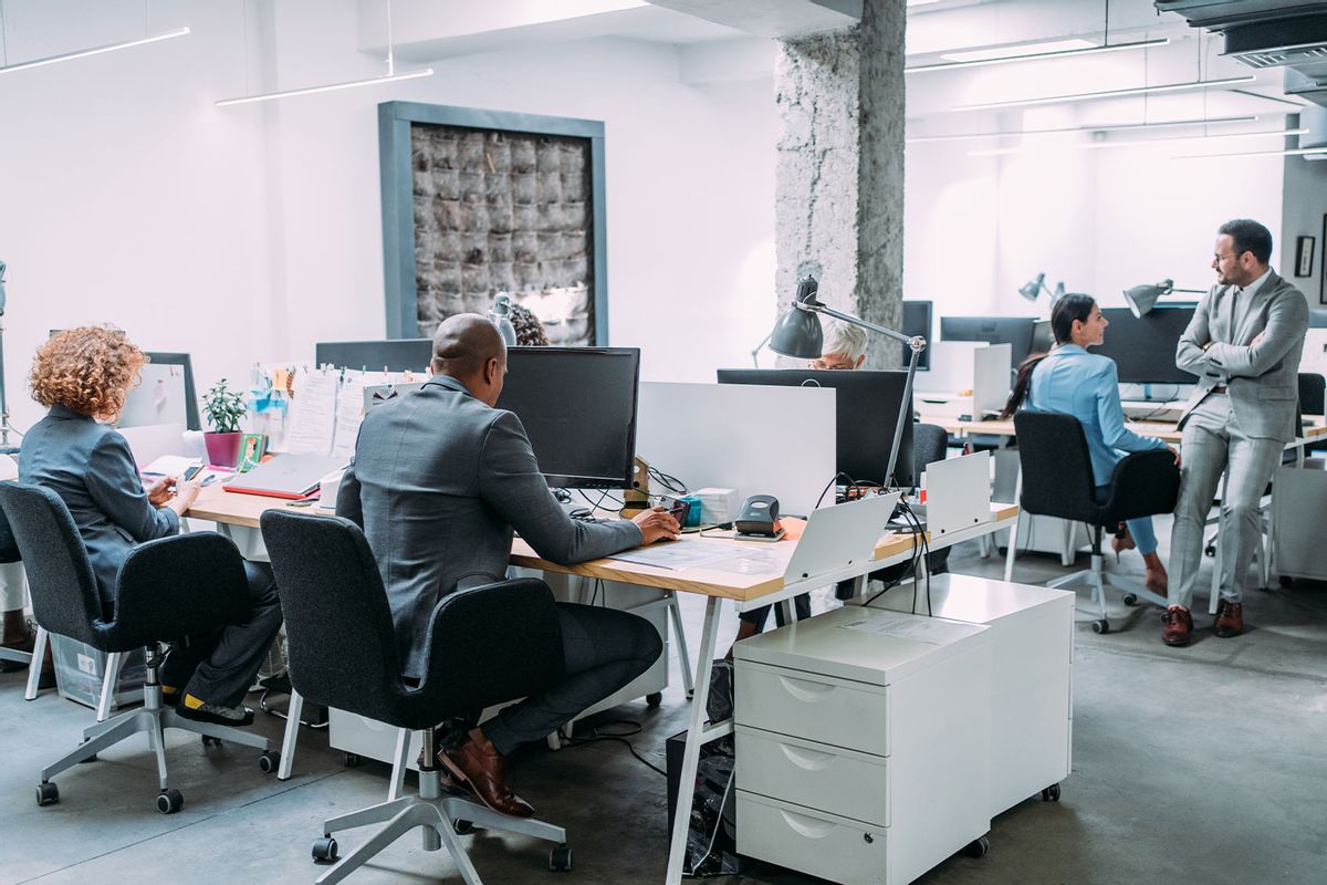Business people working at a the office (Getty Images/Violeta Stoimenova)